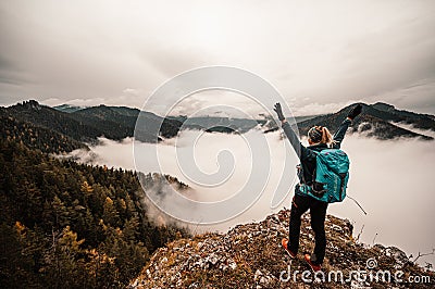 Travel lifestyle concept. Adventure summer vacations outdoor. Gilr enjoying day in the mountain. Stock Photo