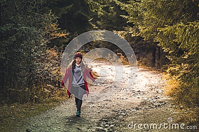 Travel lifestyle concept. Adventure summer vacations outdoor. Portrait gilr enjoying day in the mountain. Stock Photo