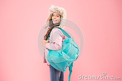 Travel and luggage concept. Useful bag. Winter vacation. Girl fashionable cutie carry bag. Hipster style. Modern Stock Photo