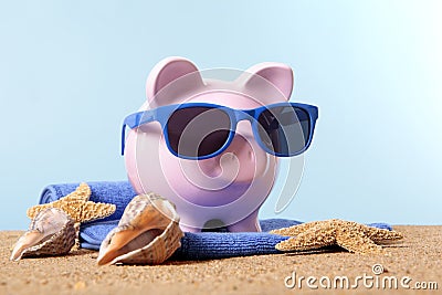 Travel money planning, vacation savings, Piggy Bank beach vacation Stock Photo