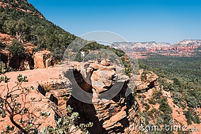 Young man admiring magnificent view of Grand Canyon, Arizona, USA. Editorial Stock Photo