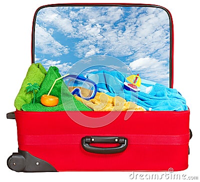 Travel red suitcase packed for summer vacation Stock Photo