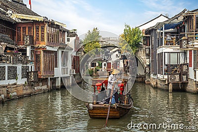 Travel in stone bridge boat and water town in zhouzhuang village Stock Photo