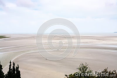 muddy tidal bay near Le Mont Saint-Michel island Stock Photo