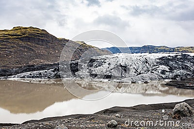 view of melting water and Solheimajokull glacier Stock Photo