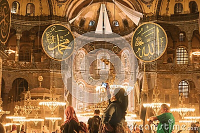 Travel to Istanbul concept. Tourist taking photo of Hagia Sophia or Ayasofya Editorial Stock Photo