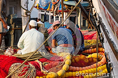 Fishermen rest after a hard day`s work. Editorial Stock Photo