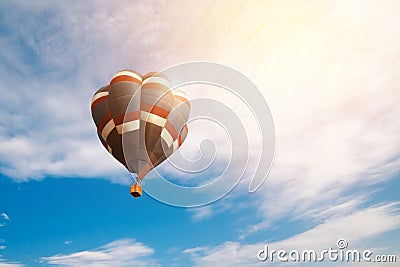 Travel and tourism concept. Colorful hot air balloon flying Stock Photo