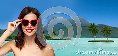 Woman with sunglasses over bora bora beach Stock Photo