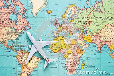 Travel. Trip. Vacation - Top view airplane with touristic map Stock Photo