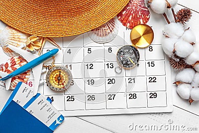 Travel and vacation concept, compass on planner calendar Stock Photo