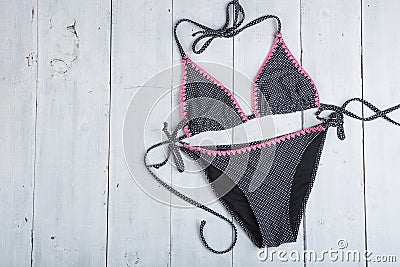 Travel and vacation concept - fashion swimsuit in polka dots Stock Photo