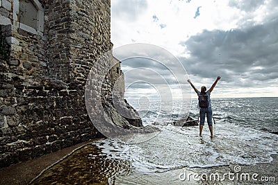 Travel Woman Tourist Enjoys the View of sea, Montenegro Stock Photo