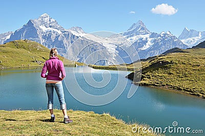 Traveler against Swiss Alps Stock Photo