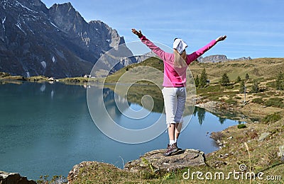 Traveler enjoying alpine view Stock Photo