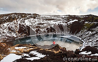 Traveler enjoying beautiful view at Kerio Crater with Lake in Iceland Editorial Stock Photo