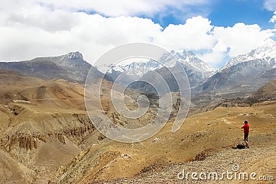 The traveler in the Himalayan mountains. Nepal. Kingdom of Upper Mustang Stock Photo