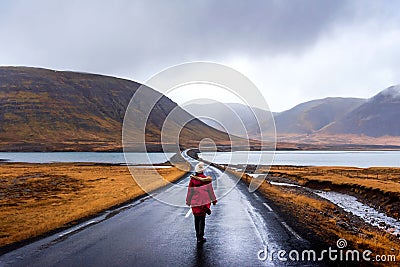 Traveler on Icelandic road in Snaefellsnes peninsula of Iceland Stock Photo