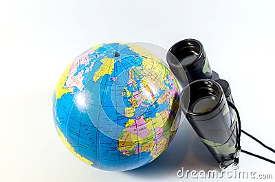 Traveler locating place by a binocular for a travel destination Stock Photo