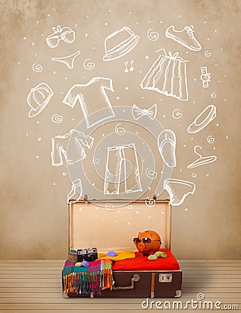 Traveler luggage with hand drawn clothes and icons Stock Photo