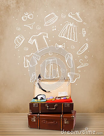 Traveler luggage with hand drawn clothes and icons Stock Photo