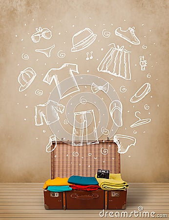 Traveler luggage with hand drawn clothes and icons Stock Photo