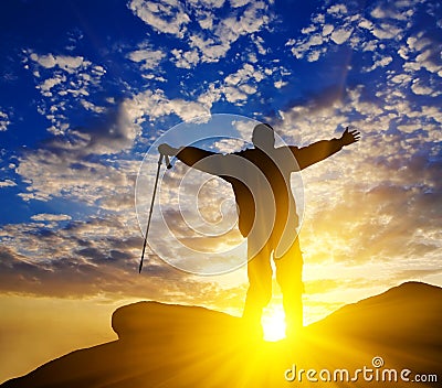 Traveler on a mountain top Stock Photo