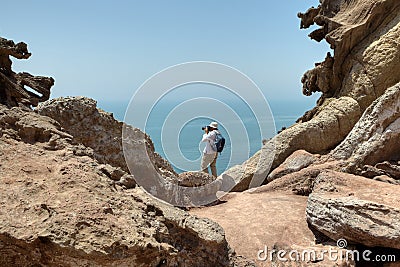 Traveler photographing nature on the Hormuz Island, Hormozgan Pr Stock Photo