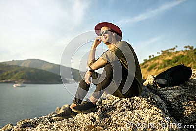 Traveler relaxing outdoors Stock Photo