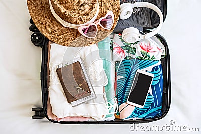 Traveler suitcase and luggage with smart phone ready for travel Stock Photo