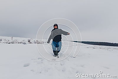 Traveler walking in a winter steppe Stock Photo