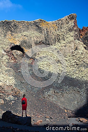 Traveler woman enjoy amazing mountain landscape, Lanzarote, Can Stock Photo