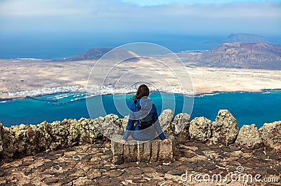 Traveler woman enjoying beautiful seascape at viewpoint Stock Photo