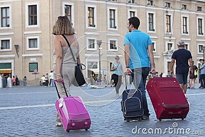 Travelers with suitcases Editorial Stock Photo