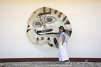 Travelers thai women wear indigo clothes fashion walk travel and posing portrait for take photo at Wat Klong Thom Museum in Khlong Editorial Stock Photo