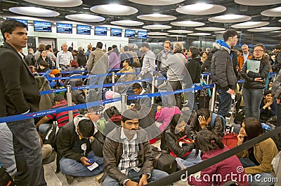 Travelers waiting in airport at snowstorm Editorial Stock Photo