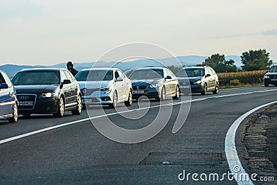 Traveling cars in motion on asphalt road, front view of cars in row on street. Bucharest, Romania, 2020 Editorial Stock Photo