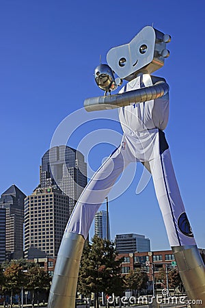 The Traveling Man is part of a steel sculpture series at Elm Street DART Station in Dallas Editorial Stock Photo