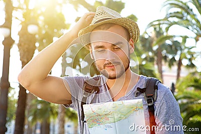 Traveling man reading map Stock Photo