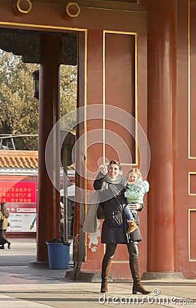 A traveling mother Editorial Stock Photo