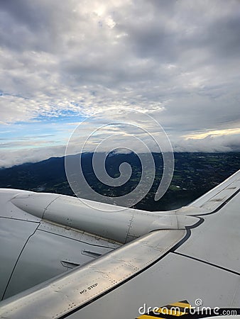 Traveling over the scenic mountains, under the clouds Stock Photo