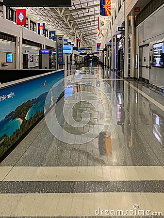 Traveling in the times of COVID 19, Empty airport concourse Editorial Stock Photo