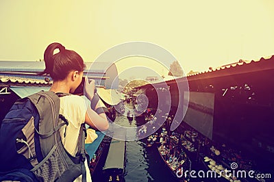Traveller shooting at Damonen Saduak floating market Stock Photo
