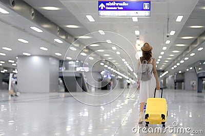 traveller woman walking at Krung Thep Aphiwat Central Terminal Stock Photo