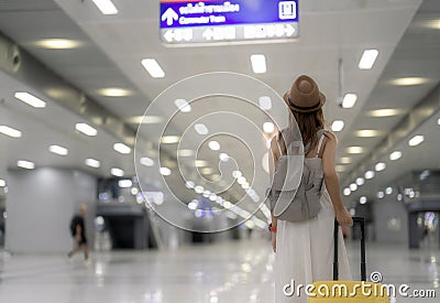 traveller woman walking at Krung Thep Aphiwat Central Terminal Stock Photo