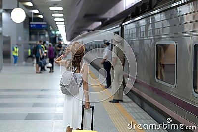 traveller woman walking at Krung Thep Aphiwat Central Terminal Stock Photo