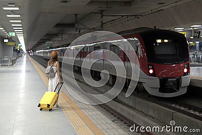 traveller woman walking at Krung Thep Aphiwat Central Terminal Stock Photo