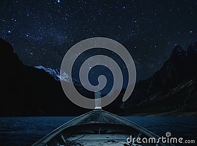 Travelling on lake at night by boat, sky full of star and milky way with mountains valley Stock Photo