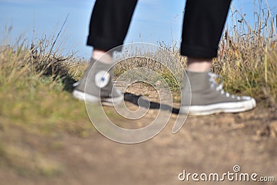 Travelling light in trailways of countryside fields Stock Photo