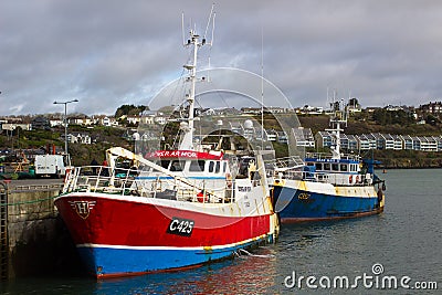 Trawlers docked in Kinsale Harbor in County Cork on the south coast of Ireland. Editorial Stock Photo